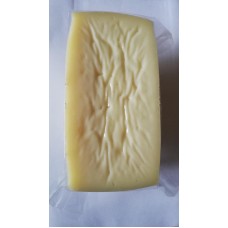Half shaped pecorino cheese